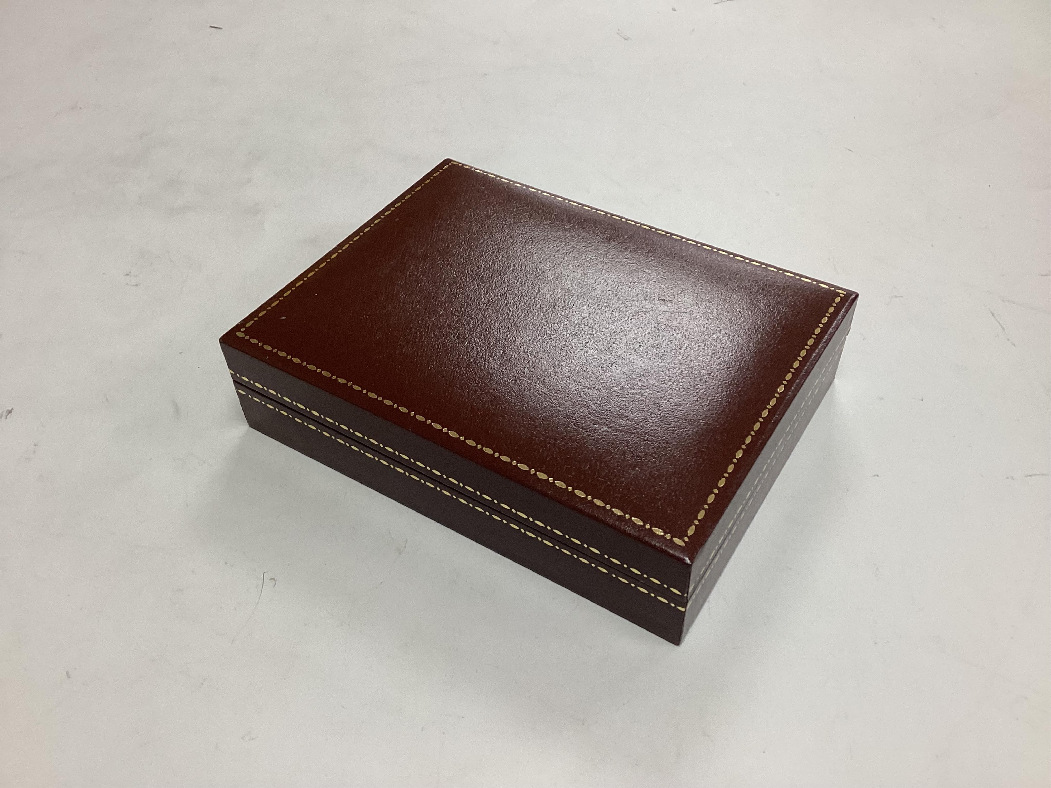 A set of Dunhill Erté playing cards, cased
